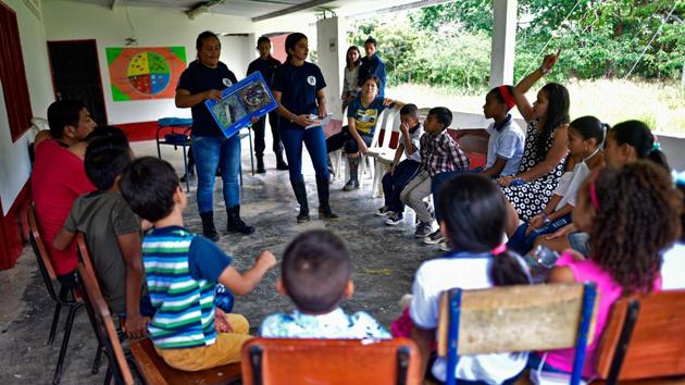 Some 7,000 fighters have surrendered their weapons since the November 2016 signing of a peace deal between the FARC and the government of then president Juan Manuel Santos. Humanicemos DH is funded by the United Nations and the European Union with an annual budget of $1.2 million. As they await full certification as deminers, they get training from experts with the UN Mine Action Service. They also get computer training, English classes and even learn about meditation. (Juan Barreto / AFP) Some 7,000 fighters have surrendered their weapons since the November 2016 signing of a peace deal between the FARC and the government of then president Juan Manuel Santos. Humanicemos DH is funded by the United Nations and the European Union with an annual budget of $1.2 million. As they await full certification as deminers, they get training from experts with the UN Mine Action Service. They also get computer training, English classes and even learn about meditation. (Juan Barreto / AFP)