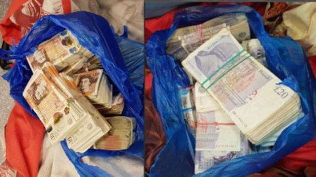 Cash seized during raids on the Indian-origin gang members that sent <span class='webrupee'>?</span>143.5 crore from the UK to Dubai over the last three years and smuggled in 17 people in 2019.(National Crime Agency)