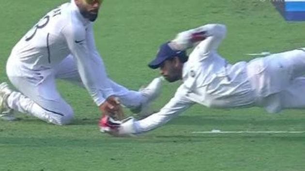 Wriddhiman Saha take a catch on Day 1 of the day and night Test between India and Bangladesh in Kolkata.(Twitter)