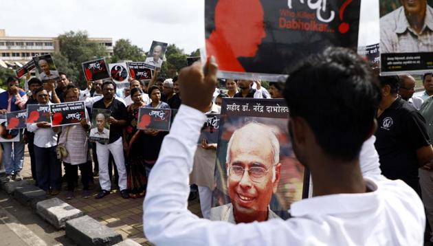 Protest demanding arrest of Dr Narendra Dabholkar’s murderer at VR Shinde bridge, near Balgandharva in Pune, India, on Tuesday, August 20, 2019.(Rahul Raut/HT file photo)