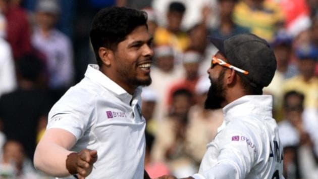 India pacer Umesh Yadav (L) celebrates with Ajinkya Rahane after the fall of a wicket.(HT Photo/ Samir Jana)