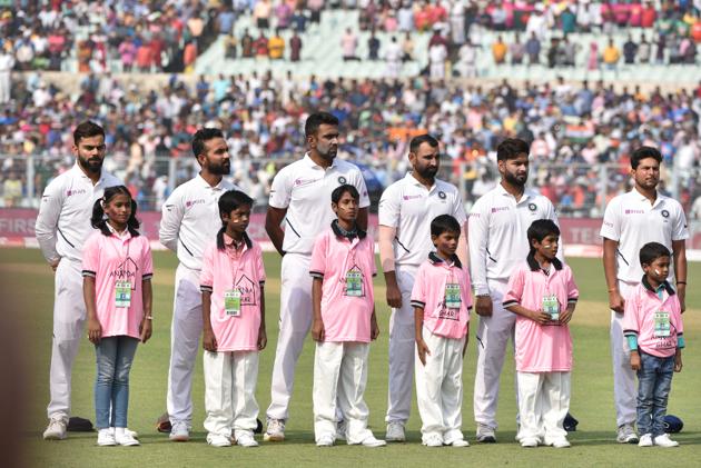 Indian Captain Virat Kohli and other players during the national anthem on the first day. (Samir Jana / Hindustan Times)
