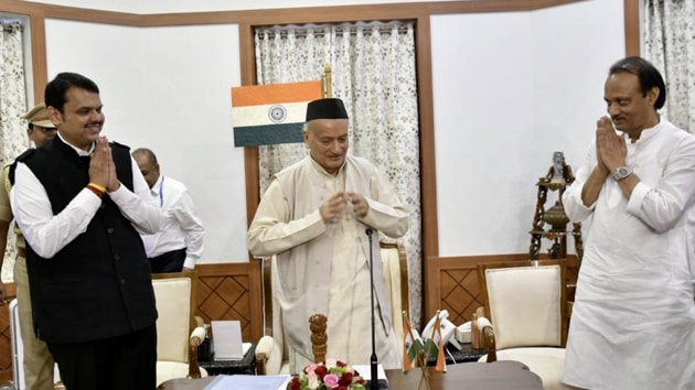 Devendra Fadnavis seen here with Governor BS Koshyari and Ajit Pawar during the oath-taking ceremony on Saturday in Mumbai. (TWITTER.) Devendra Fadnavis seen here with Governor BS Koshyari and Ajit Pawar during the oath-taking ceremony on Saturday in Mumbai. (TWITTER.)
