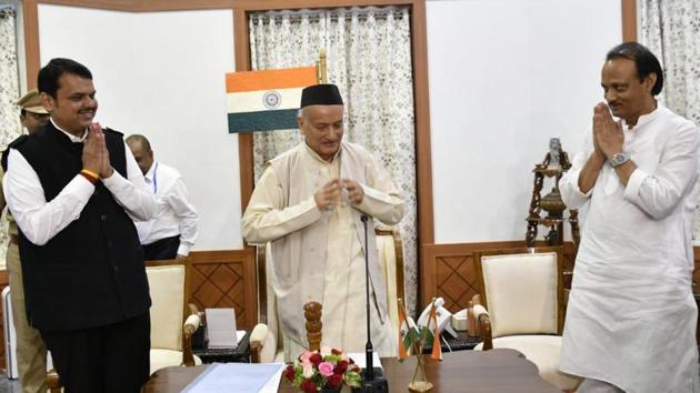 Devendra Fadnavis and Ajit Pawar with Maharashtra Governor Bhagat Singh Koshyari at the oath-taking ceremony at the Raj Bhawan inMumbai on Saturday.(Santosh Harhare/HT Photo) Devendra Fadnavis and Ajit Pawar with Maharashtra Governor Bhagat Singh Koshyari at the oath-taking ceremony at the Raj Bhawan inMumbai on Saturday.(Santosh Harhare/HT Photo)