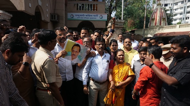 NCP workers in Thane protest against Ajit Pawar who was sworn in as Deputy Chief Minister of Maharashtra on Saturday. (HT PHOTO) NCP workers in Thane protest against Ajit Pawar who was sworn in as Deputy Chief Minister of Maharashtra on Saturday. (HT PHOTO)