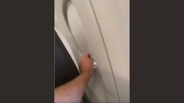 The video of two men engaged in ‘window shade war’ has created quite a stir. (Instagram/passengershaming) The video of two men engaged in ‘window shade war’ has created quite a stir. (Instagram/passengershaming)