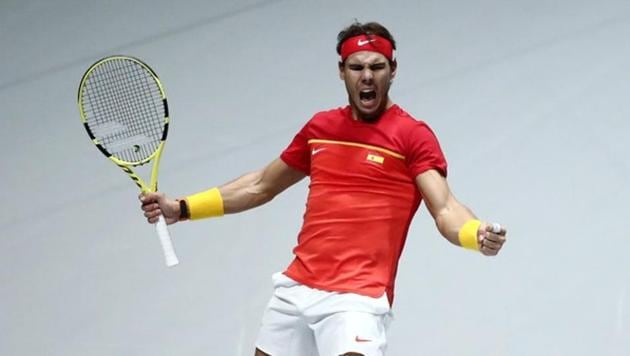 Rafael Nadal celebrates winning his doubles match with Marcel Granollers-Pujol against Argentina's Maximo Gonzalez and Leonardo Mayer. (REUTERS) Rafael Nadal celebrates winning his doubles match with Marcel Granollers-Pujol against Argentina's Maximo Gonzalez and Leonardo Mayer. (REUTERS)