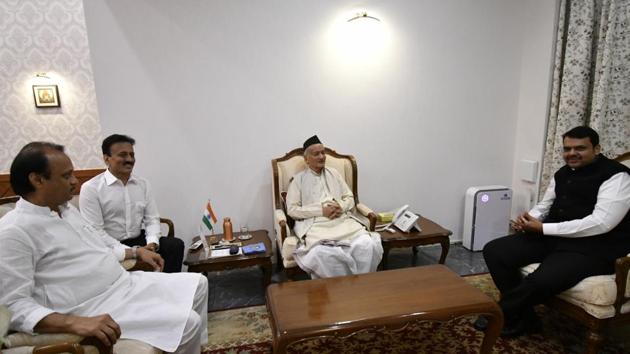 Devendra Fadnavis appointed as Maharashtra CM and Ajit pawar as Deputy CM in presence of Maharashtra governor Bhagat Singh Koshyari at Raj Bhavan in Mumbai on November 23, 2019. (HT PHOTO) Devendra Fadnavis appointed as Maharashtra CM and Ajit pawar as Deputy CM in presence of Maharashtra governor Bhagat Singh Koshyari at Raj Bhavan in Mumbai on November 23, 2019. (HT PHOTO)