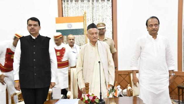Bharatiya Janata Party (BJP) leader Devendra Fadnavis and Nationalist Congress Party(NCP) leader Ajit Pawar took oath as the chief minister and deputy chief minister of Maharashtra after the President’s rule was revoked. According to a Home Ministry notification, President Ram Nath Kovind signed the proclamation for revocation of the central rule Saturday morning. (HT Photo)