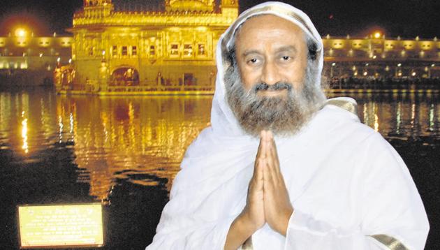 Spiritual leader and founder of Art of Living Foundation Sri Sri Ravi Shankar after paying obeisance at the Golden Temple in Amritsar on Saturday. He will be chief guest at Guru Nanak Dev University’s 50th foundation day function on Sunday. “I will definitely go to Nankana Sahib and Kartarpur Sahib gurdwaras,” he said, without revealing any schedule.(Sameer Sehgal/ HT)