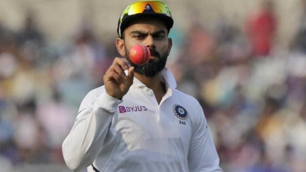 India's captain Virat Kohli tosses a pink ball.(AP)