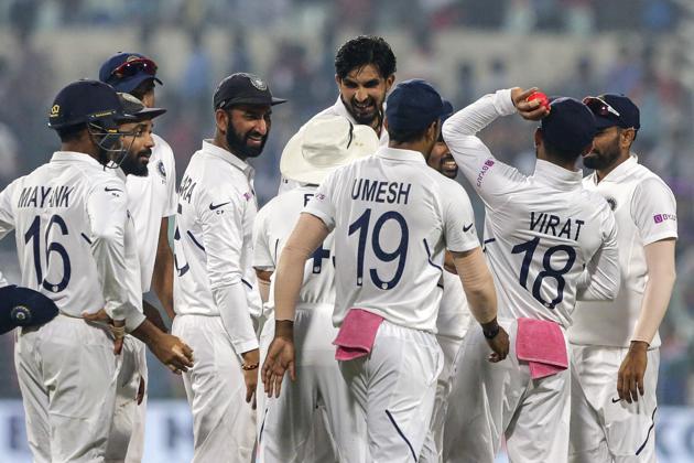 Indian cricketers celebrate the wicket of Bangladesh's Imrul Kayes during the second day of the second test. (AP)
