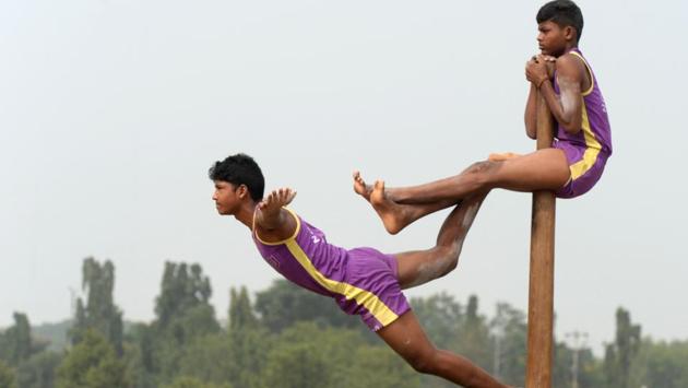 Members of the National Cadet Corps (NCC) practise an acrobatic manoeuvre known as 'Mallakhamb' for the upcoming NCC day celebrations in Secunderabad, Telangana. (Noah Seelam / AFP)