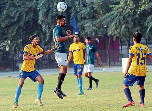Sportspersons taking part in a football event during the Punjab State Games organised by the sports department at Polo Grounds in Patiala on Saturday. (BHARAT BHUSHAN/HT) Sportspersons taking part in a football event during the Punjab State Games organised by the sports department at Polo Grounds in Patiala on Saturday. (BHARAT BHUSHAN/HT)