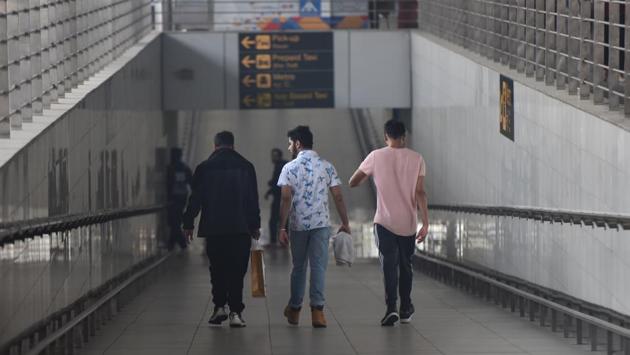 Illegal immigrants after they were deported from the US, at Terminal 3, IGI airport, in New Delhi. More than 140 Indians, including 3 women, were deported from Arizona in the United States landed at the New Delhi international airport around 7am on Wednesday. Majority of these deported Indians, who are in the age group of 25-35, hail from Punjab and Haryana and a few from Gujarat in the age group of 25-35. (Sanchit Khanna / HT Photo)