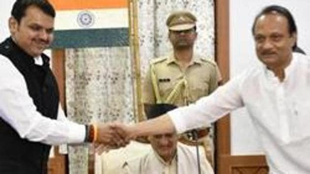 Devendra Fadnavis appointed as Maharashtra CM and Ajit pawar as Deputy CM in presence of Maharashtra governor Bhagat Singh Koshyari at Raj Bhavan in Mumbai (HT PHOTO) Devendra Fadnavis appointed as Maharashtra CM and Ajit pawar as Deputy CM in presence of Maharashtra governor Bhagat Singh Koshyari at Raj Bhavan in Mumbai (HT PHOTO)