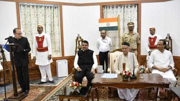 Devendra Fadnavis appointed as Maharashtra CM and Ajit pawar as Deputy CM in presence of Maharashtra governor Bhagat Singh Koshyari at Raj Bhavan in Mumbai. (HT PHOTO)