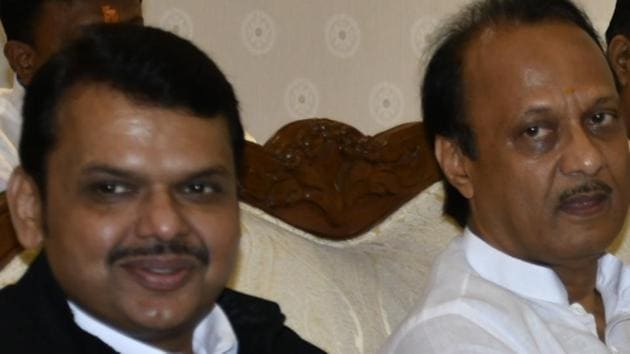 Devendra Fadnavis appointed as Maharashtra CM and Ajit pawar as Deputy CM in presence of Maharashtra governor Bhagat Singh Koshyari at Raj Bhavan in Mumbai. (HT PHOTO) Devendra Fadnavis appointed as Maharashtra CM and Ajit pawar as Deputy CM in presence of Maharashtra governor Bhagat Singh Koshyari at Raj Bhavan in Mumbai. (HT PHOTO)