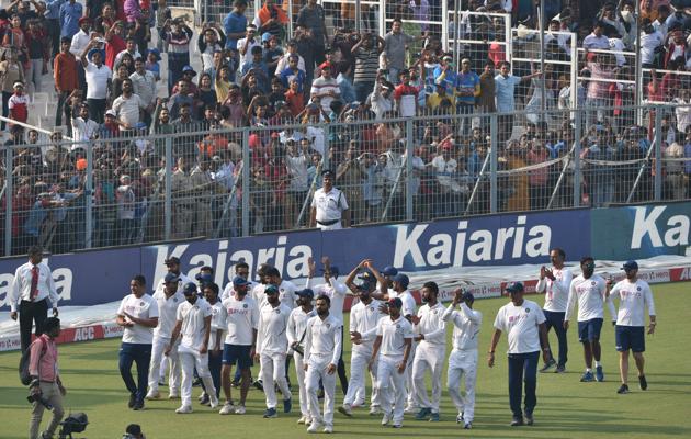 Indian team captain Virat Kohli and his teammates with the trophy during a victory lap. (Samir Jana / Hindustan Times)