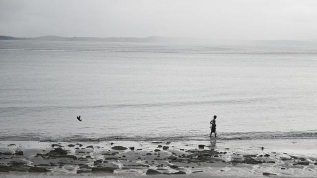 A man fishes on the shore in Kyaukphyu. The camp residents are desperate for a chance to rebuild their lives. “It’s just like a prison,” says camp leader Phyu Chay of his current ‘home’, adding: “There are no jobs and we struggle to get hold of proper medication.” (Ye Aung Thu / AFP)