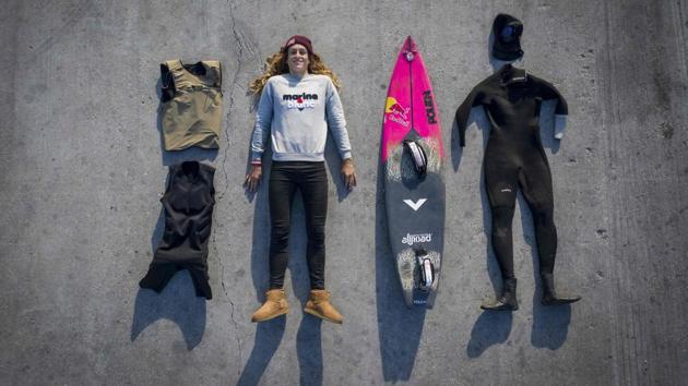 Dupont poses with her equipment -- airbag, life jacket, padded undersuit, surboard with footstraps, wetsuit -- for a big wave surfing session in Nazare. The masses missed out on seeing Dupont have the ride of her life on November 13. It could be a new surfing world record set by a woman. “I began riding the wave, I felt I was going faster than usual, and that it was steeper,” said the 28-year-old surfer. (Olivier Morin / AFP) Dupont poses with her equipment -- airbag, life jacket, padded undersuit, surboard with footstraps, wetsuit -- for a big wave surfing session in Nazare. The masses missed out on seeing Dupont have the ride of her life on November 13. It could be a new surfing world record set by a woman. “I began riding the wave, I felt I was going faster than usual, and that it was steeper,” said the 28-year-old surfer. (Olivier Morin / AFP)