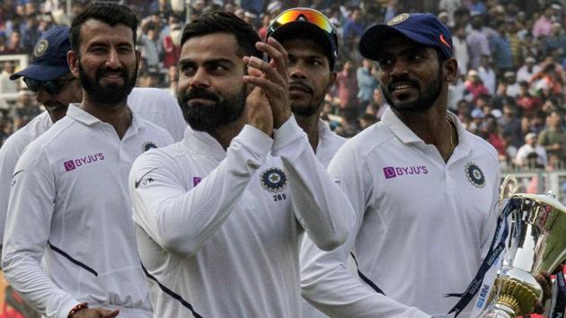 Virat Kohli applauds as he leads his team in a victory lap. (AP) Virat Kohli applauds as he leads his team in a victory lap. (AP)