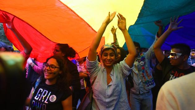 People hold the Pride flag while marching towards Jantar Mantar. Over the years, the rainbow has emerged as the ultimate symbol of different genders and sexualities. Pride parades are a celebration of not just of same-sex love and desire, but also of self-acceptance, self-love, and love to every individual irrespective of their gender identity or sexual orientation. (Amal KS / HT Photo) People hold the Pride flag while marching towards Jantar Mantar. Over the years, the rainbow has emerged as the ultimate symbol of different genders and sexualities. Pride parades are a celebration of not just of same-sex love and desire, but also of self-acceptance, self-love, and love to every individual irrespective of their gender identity or sexual orientation. (Amal KS / HT Photo)