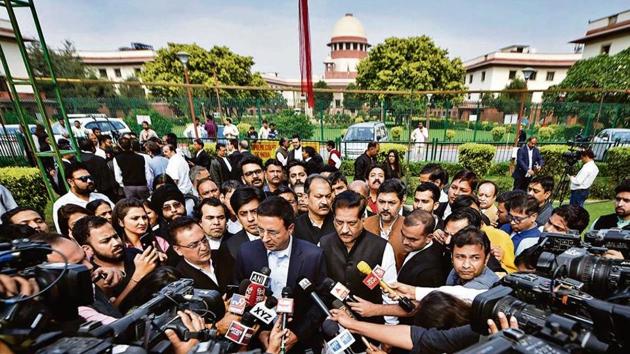 Congress leaders Randeep Surjewala and Prithviraj Chavan address the media outside the Supreme Court premises in New Delhi on Sunday.(PTI)