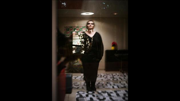 Mathilde, 35, a musician from Paris, is reflected in a window as she poses for a portrait. After Mathilde experienced domestic violence when she was 20 years old, she feels today like a survivor. It can take between three weeks and two months for authorities to act on a complaint, leaving the victim “in a very fragile situation,” according to Frederique Martz, who runs anti-domestic violence organization Women Safe. (Kamil Zihnioglu / AP) Mathilde, 35, a musician from Paris, is reflected in a window as she poses for a portrait. After Mathilde experienced domestic violence when she was 20 years old, she feels today like a survivor. It can take between three weeks and two months for authorities to act on a complaint, leaving the victim “in a very fragile situation,” according to Frederique Martz, who runs anti-domestic violence organization Women Safe. (Kamil Zihnioglu / AP)