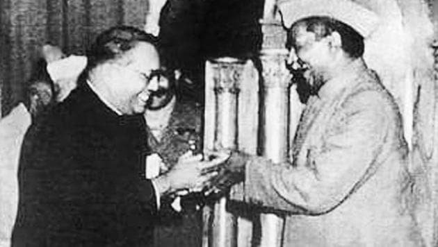 Dr BR Ambedkar, chairman of the Drafting Committee (left), presents the final draft of the Indian Constitution to Dr Rajendra Prasad.(Alamy Stock Photo) Dr BR Ambedkar, chairman of the Drafting Committee (left), presents the final draft of the Indian Constitution to Dr Rajendra Prasad.(Alamy Stock Photo)