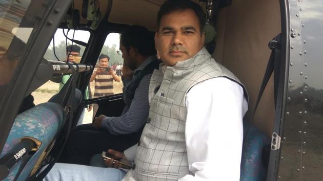 The two officers who allegedly took a free joyride in a helicopter in Unnao on Monday.(Sourced) The two officers who allegedly took a free joyride in a helicopter in Unnao on Monday.(Sourced)