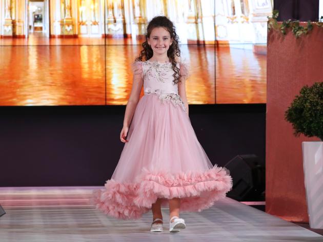 MINSK, Nov. 23, 2019 (Xinhua) -- A child model presents new children’s wear during the Kids Fashion Zone, a children’s wear sale exhibition for charity, in Minsk, Belarus, Nov. 23, 2019. The activity was held here to mark the World Children’s Day of 2019. (Xinhua/Henadz Zhinkov/IANS) (Xinhua)