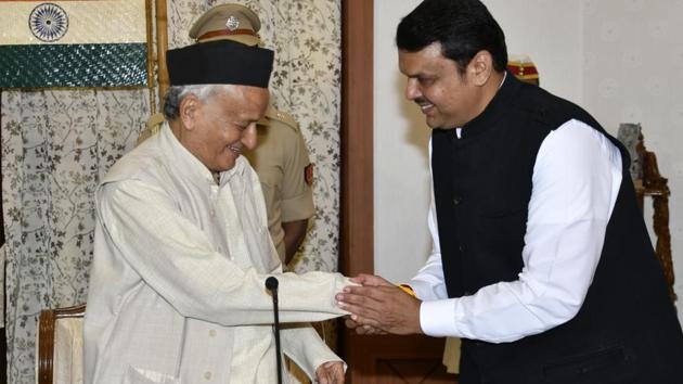 Devendra Fadnavis with Maharashtra governor Bhagat Singh Koshyari at Raj Bhavan in Mumbai, India, on Saturday, November 23, 2019.(HT file photo)