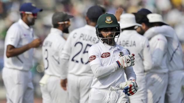 Bangladesh's captain Mominul Haque walks back to the pavilion after being dismissed during the first day of the second Test match between India and Bangladesh in Kolkata, India.(AP)
