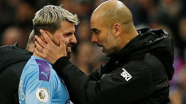 Manchester City manager Pep Guardiola with Sergio Aguero.(REUTERS)