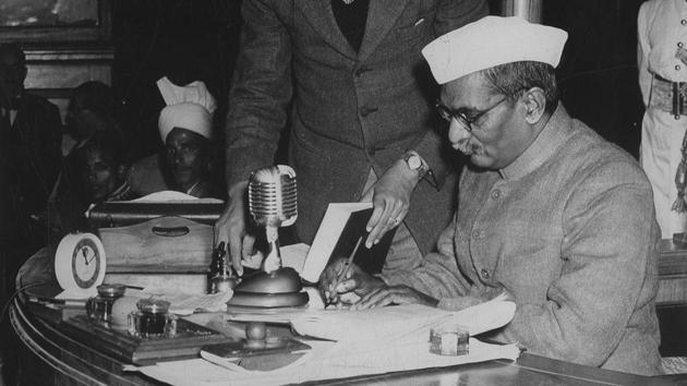 Rajendra Prasad, President of Constitutional Assembly sign new Constitution of the Republic of India - HT Photo.