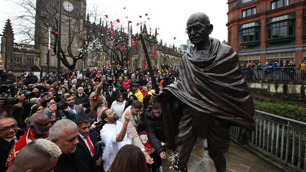 A 9-feet bronze statue of Mahatma Gandhi by noted artist Ram V. Sutar was on Monday installed in the popular Medieval Quarter of Manchester A 9-feet bronze statue of Mahatma Gandhi by noted artist Ram V. Sutar was on Monday installed in the popular Medieval Quarter of Manchester