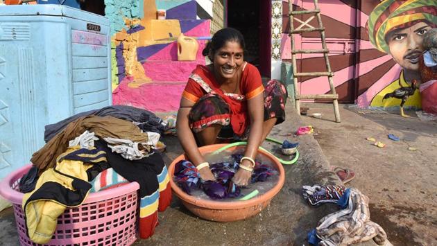 A woman from the community washes clothes. The members of the Waghri community shifted from different parts of the country and set up their shanties here in 1964. They were allotted plots in 1977 and ever since this colony has been their home. However, Popat Lal, a 63-year-old resident, said that their income has either stagnated or has dwindled over the past two decades. (Sanjeev Verma / HT Photo) A woman from the community washes clothes. The members of the Waghri community shifted from different parts of the country and set up their shanties here in 1964. They were allotted plots in 1977 and ever since this colony has been their home. However, Popat Lal, a 63-year-old resident, said that their income has either stagnated or has dwindled over the past two decades. (Sanjeev Verma / HT Photo)