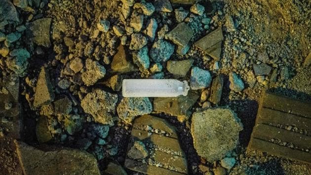 A saline solution capsule -- typically used to wash the eyes after exposure to tear gas or pepper spray -- is seen on a road outside the main entrance of the Hong Kong Polytechnic University campus in the Hung Hom district of Hong Kong, an area that saw multiple battles between anti-government protesters and police. The objects strewn at the campus are attest to the chaos and ferocity of clashes between protesters and police. (Anthony Wallace / AFP) A saline solution capsule -- typically used to wash the eyes after exposure to tear gas or pepper spray -- is seen on a road outside the main entrance of the Hong Kong Polytechnic University campus in the Hung Hom district of Hong Kong, an area that saw multiple battles between anti-government protesters and police. The objects strewn at the campus are attest to the chaos and ferocity of clashes between protesters and police. (Anthony Wallace / AFP)