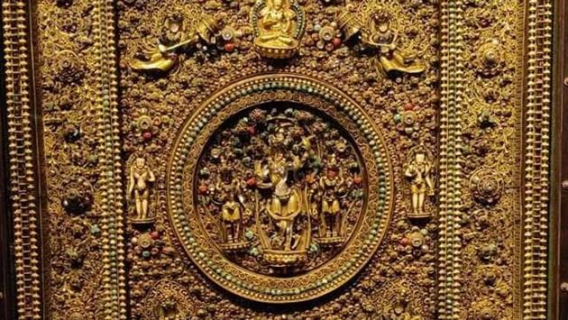 Chintamani Lokeshvara: In Sanskrit, though ‘Chintamani’ means a jewel that grants wishes, in this context it refers to the Buddhist deity Lokeshvara, who fulfils all the physical and spiritual needs of his devotees. n this wooden plaque, Chintamani Lokeshvara is depicted with his right hand held near the navel in the sharanagamana gesture (gesture of giving refuge) and in his left hand he holds a branch of a fabulous tree bearing jewels as fruits. (deepinder singh kapany) 