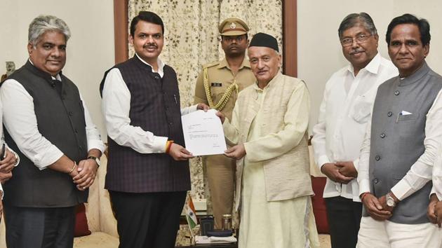 Devendra Fadnavis submits his resignation to Governor Koshyari on November 26, hours after Deputy Chief Minister Ajit Pawar also submitted his resignation --barely 80 hours after they were sworn in on November 23. The political development was greeted with distribution of sweets and celebrations by activists of the Shiv Sena, Natioanlist Congress Party and Congress, besides other smaller parties. (PTI)