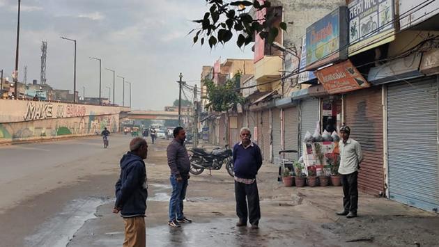 No vehicles were allowed to be parked on the Gill Road for display in Ludhiana on Wednesday. Hoardings on the shops were also removed.(Harsimar Pal Singh/HT)