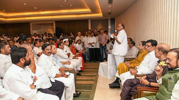 NCP chief Sharad Pawar speaks as Shiv Sena President Uddhav Thackeray and other leaders look on during a meeting to pick Thackeray as their nominee for Maharashtra chief minister's post on November 26. Thackeray is set to be the next chief minister after a resolution proposing his name was passed unanimously by all MLAs of Shiv Sena, NCP and Congress. (PTI)