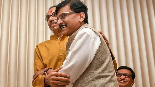 Shiv Sena President Uddhav Thackeray being greeted by party leader Sanjay Raut after he was chosen as the nominee for Maharashtra chief minister's post. (PTI photo) Shiv Sena President Uddhav Thackeray being greeted by party leader Sanjay Raut after he was chosen as the nominee for Maharashtra chief minister's post. (PTI photo)