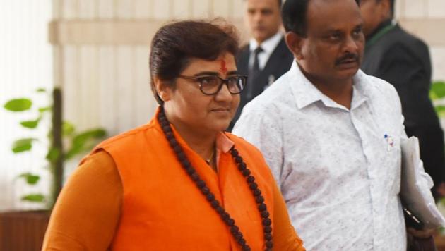 BJP MP Pragya Thakur arrives to attend the BJP parliamentary party meeting during the winter session of Parliament, in New Delhi.(Mohd Zakir/HT PHOTO)