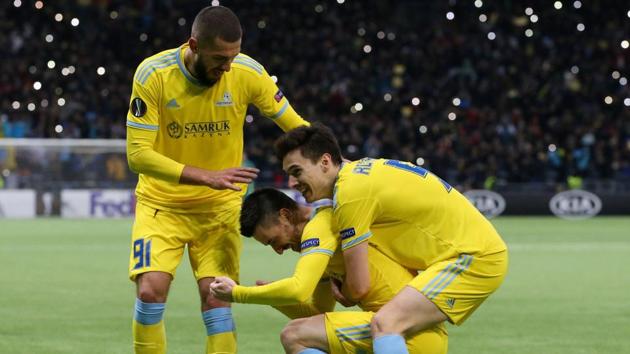 Astana's Antonio Rukavina celebrates with teammates.(REUTERS)