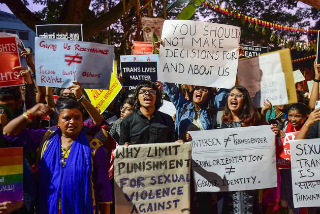 LGBTQI members and their supporters raise slogans against the central government over the passage of transgender bill.(PTI Photo)