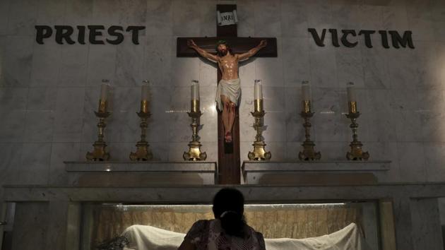 A woman prays at the St. Anthony’s Shrine, which was attacked on Easter Sunday by a suicide bomber, in Colombo. With the day-to-day violence of the civil war in the past, Buddhist nationalists in recent years have accused the government of paying too much heed to minorities, pointing in part to the previous government, which though led by Sinhalese Buddhists, also included ministers who were Hindu and Muslim. (Dar Yasin / AP)