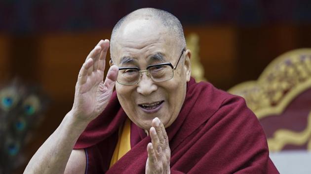 Tibetan spiritual leader the Dalai Lama greets devotees at the Buddha Park in Bomdila, Arunachal Pradesh.(File photo: AP)