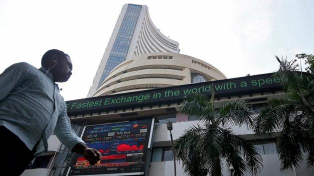 A man walks past the Bombay Stock Exchange (BSE) building in Mumbai. On a monthly basis, Sensex gained 1.66% and Nifty was up 1.5% in November.(Photo: Reuters) A man walks past the Bombay Stock Exchange (BSE) building in Mumbai. On a monthly basis, Sensex gained 1.66% and Nifty was up 1.5% in November.(Photo: Reuters)
